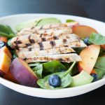 Paleo Salad with spinach, peaches, and chicken